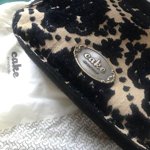 Petunia Pickle Cake Clutch Diaper Bag